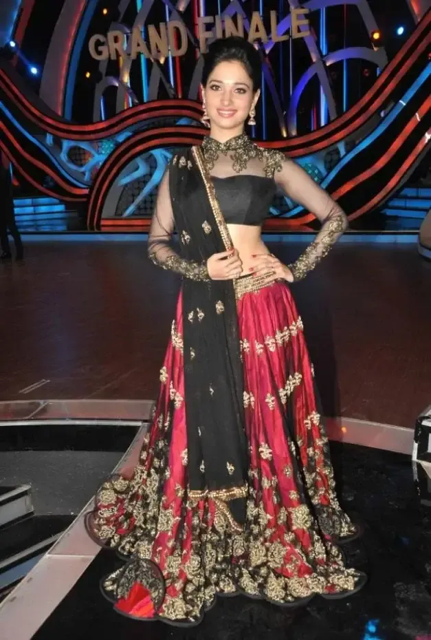 TAMANNA BHATIA HIP NAVEL STILLS IN BLACK LEHENGA CHOLI 7